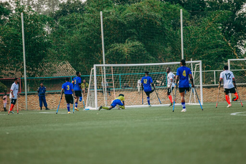 A vibrant amputee football match showcasing skill and teamwork on the field.